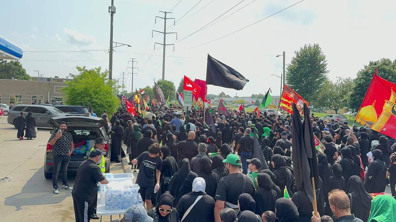 آلاف الشيعة يحيون المسيرة العاشورائية السنوية الحادية عشرة في ديربورن الأمريكية