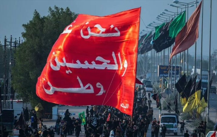 Imam Hussein’s Flag of 210 Meters Marches from Faw to Karbala 