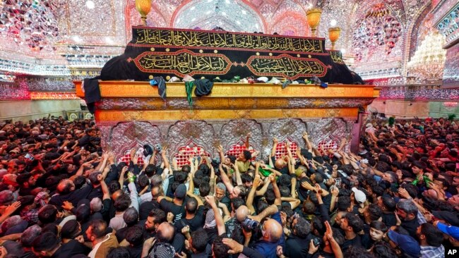 Millions of Muslim pilgrims rally in Iraq